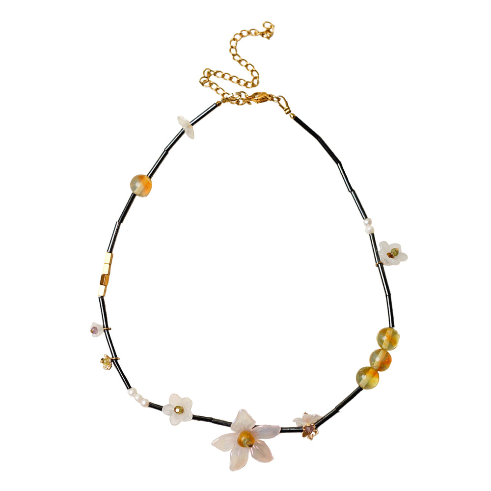 Rue Flower black, white, gold, soft pink, and yellow