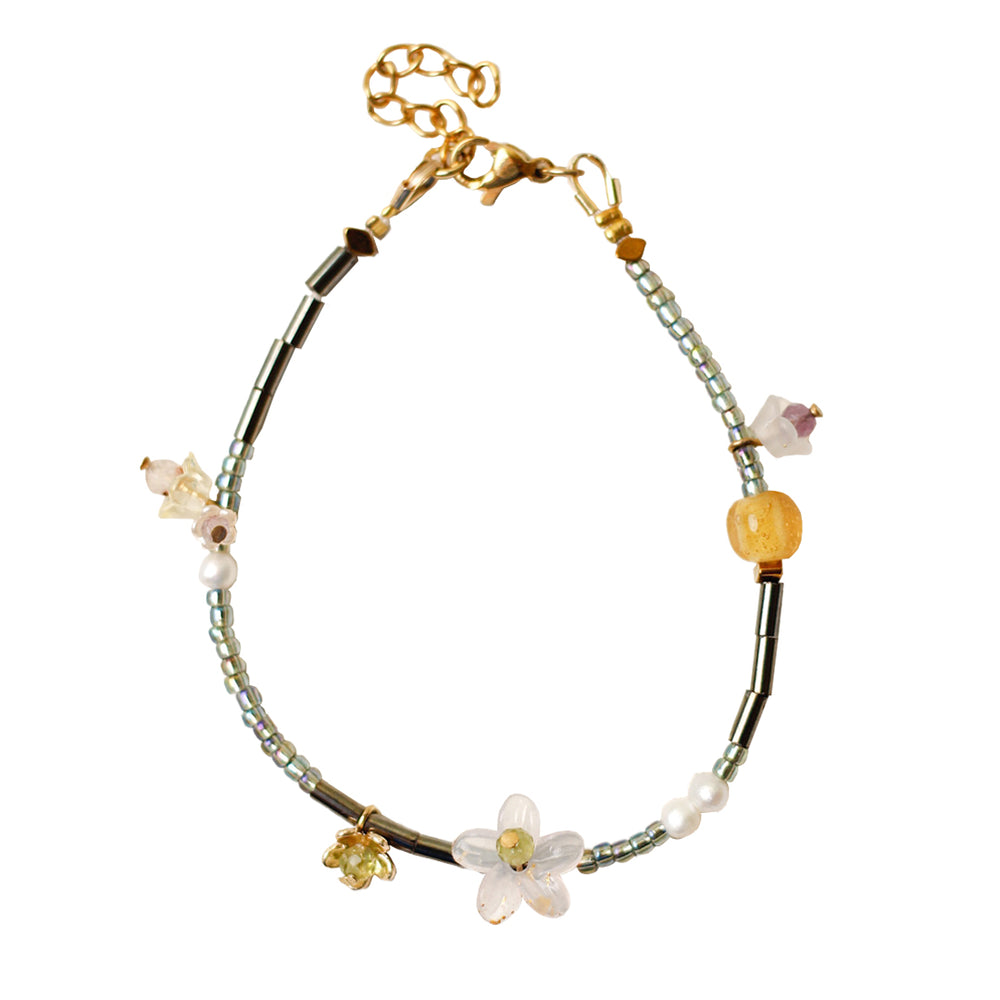 Rue black, white, gold, soft pink, metalic blue, and yellow